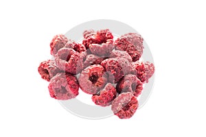 Freeze dried raspberries on a white background.