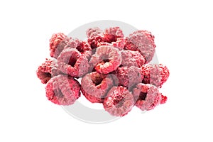 Freeze dried raspberries on a white background. photo