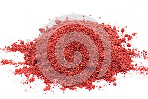 Freeze dried strawberries on a white background, powder