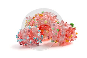 Freeze Dried Sweet and Tangy Candy with Small Candies on the Outside of a Chewy Center Isolated on a White Background