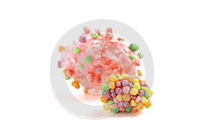 Freeze Dried Sweet and Tangy Candy with Small Candies on the Outside of a Chewy Center Isolated on a White Background