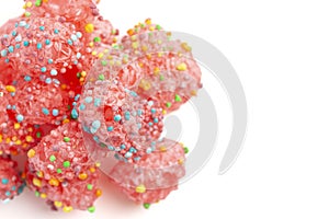 Freeze Dried Sweet and Tangy Candy with Small Candies on the Outside of a Chewy Center Isolated on a White Background