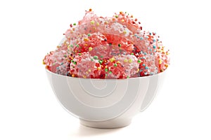 Freeze Dried Sweet and Tangy Candy with Small Candies on the Outside of a Chewy Center Isolated on a White Background photo