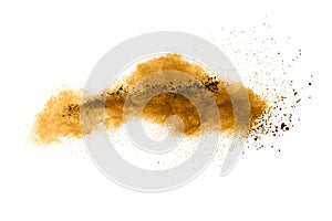 Freeze motion of brown dust explosion.Stopping the movement of brown powder