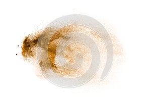 Freeze motion of brown powder exploding. Abstract design of brown dust cloud against white background