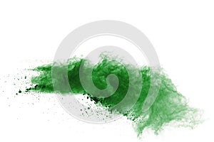 Freeze motion of green powder exploding on white background
