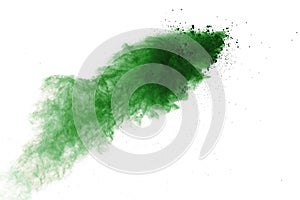 Freeze motion of green powder exploding on white background