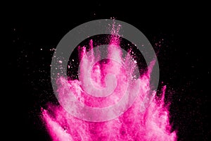 Freeze motion of pink powder exploding.