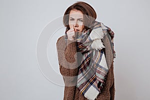 Freeze woman in sweater and scarf