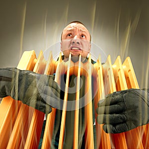 Freezing man holding hot oil radiator