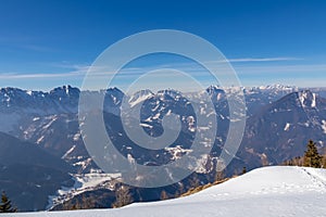 Freiberg - Panoramic view on snow capped mountain peaks of Karawanks in Carinthia (Kaernten), Austria. Julian Alps.