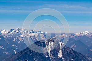 Freiberg - Panoramic view on snow capped mountain peaks of Karawanks in Carinthia (Kaernten), Austria. Julian Alps.