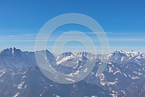 Freiberg - Panoramic view on snow capped mountain peaks of Karawanks in Carinthia (Kaernten), Austria. Julian Alps.