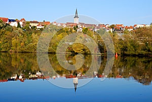 Freiberg town and its reflection in Nekar river photo