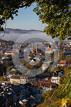 Freiburg im Breisgau, Germany - 11 09 2012: Scenic view to the city and St. Johann church from the mountain