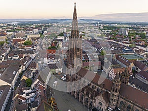 Freiburg im Breisgau, Germany at Sunrise. Aerial Drone Shot on Freiburger Dom Cathedral. 4k Drohne Footage photo