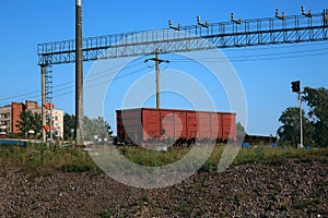 Freight car standing on the tracks of the station