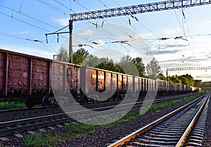 Freight Cars Deliver Construction and bulk Materials such as stone, sand and gravel and charcoal. Open Hoppers on railroads