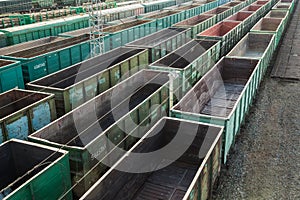 Freight cars at a large railway station. Cargo transportation and railway trains