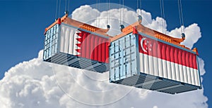 Freight containers with Bahrain and Singapore national flags.