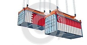 Freight containers with Bahrain and Singapore national flags.