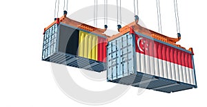 Freight containers with Belgium and Singapore national flags.