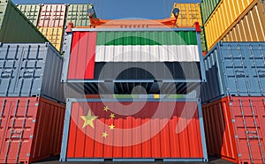 Freight containers with China and United Arab Emirates national flags.