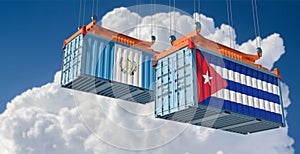 Freight containers with Cuba and Guatemala national flags.