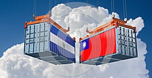 Freight containers with El Salavador and Taiwan national flags.