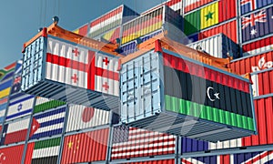 Freight containers with Georgia and Libya national flags.