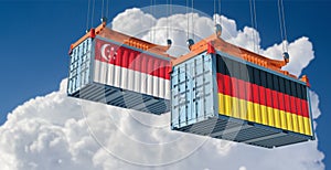 Freight containers with German and Singapore national flags.