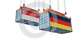 Freight containers with German and Singapore national flags.