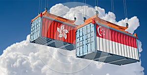 Freight containers with Hong Kong and Singapore national flags.