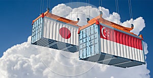 Freight containers with Japan and Singapore national flags.