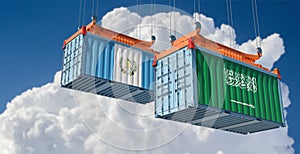 Freight containers with Saudi Arabia and Guatemala national flags.