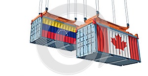 Freight containers with Venezuela and Canada national flags.