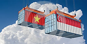 Freight containers with Vietnam and Singapore national flags.