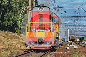 Freight locomotive arrives to the station