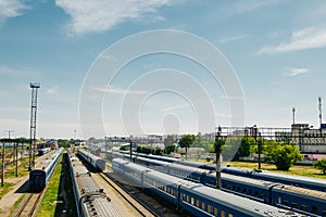 Freight and passenger train waiting at the train station parking lot.Cargo transit.import export and business logistic.Aerial view