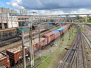 Freight and passenger train waiting at the train station parking lot.Cargo transit.import export and business logistic.Aerial view