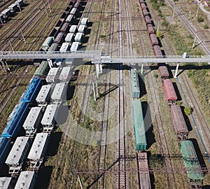 Freight railroad cars are at the railway station. view from above