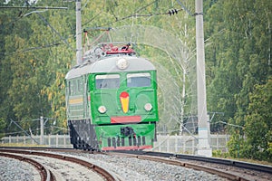 Freight retro electric locomotive at cloudy day