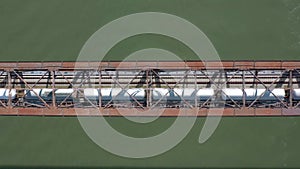Freight Train Crossing an Iron Bridge