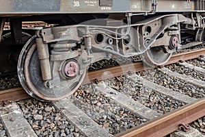 Freight train with derailed wheel set photo