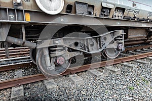 Freight train with derailed wheel set photo
