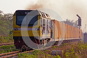 Freight train by diesel locomotive on the railway