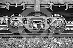 Freight train, iron wheels train close-up, black and white color