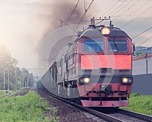 Freight train moves at evening time