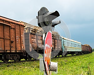 Freight train passing the railroad crossing