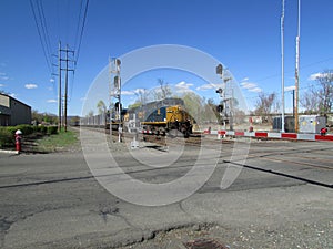 Freight train passing railroad crossing in West Haverstraw, NY.